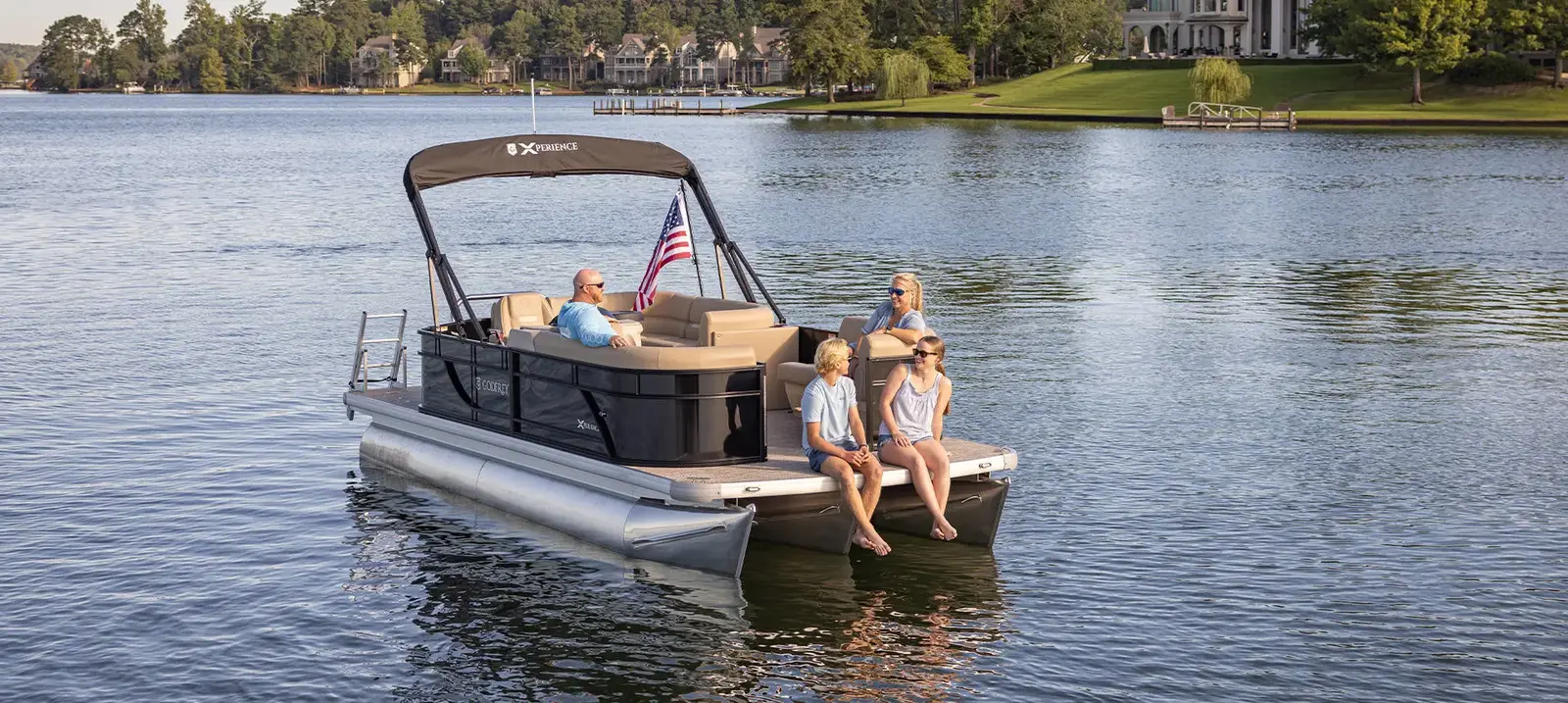 2026 Godfrey Xperience pontoon with family aboard